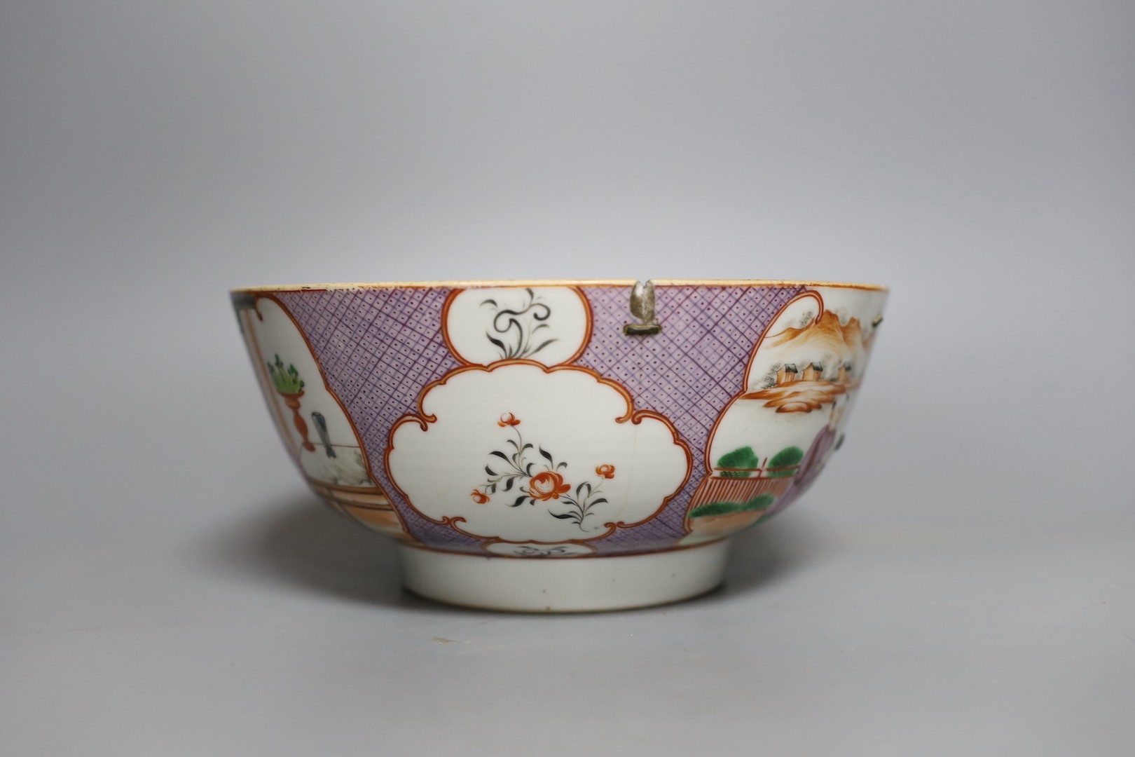 Two 18th century Chinese export bowls, a similar tea bowl and another Chinese blue and white tea bowl, largest 20cm diameter